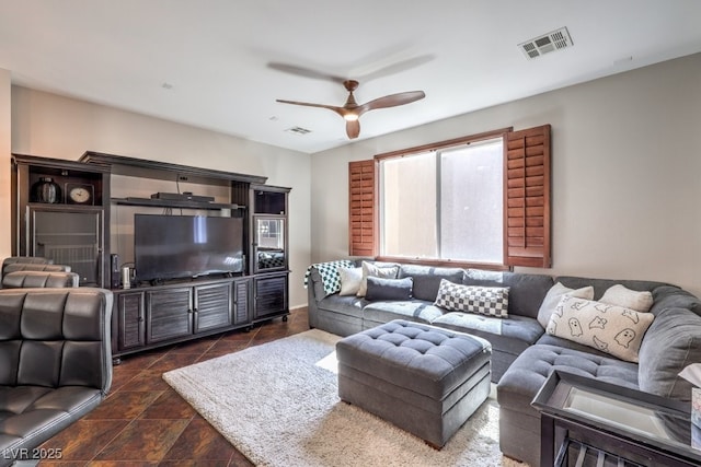 living room featuring ceiling fan