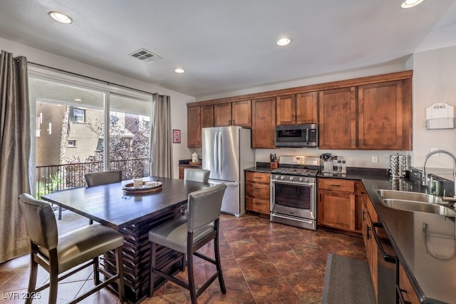 kitchen with sink and stainless steel appliances