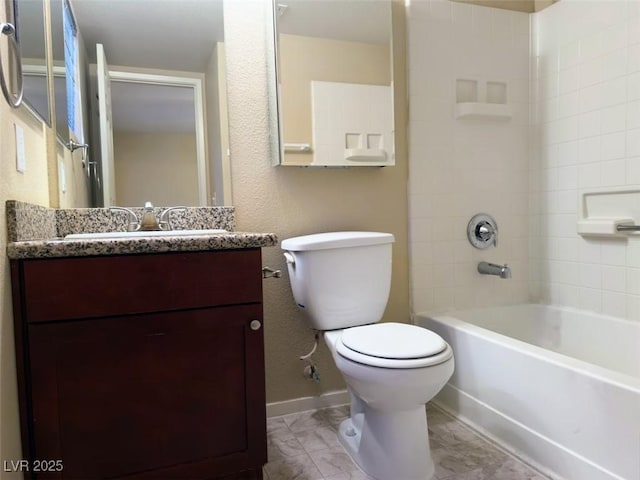 full bathroom with vanity, toilet, and tiled shower / bath