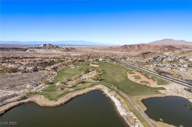 bird's eye view with a water and mountain view