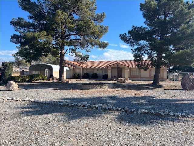 view of front of house featuring a carport