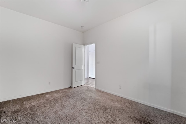 spare room with carpet flooring