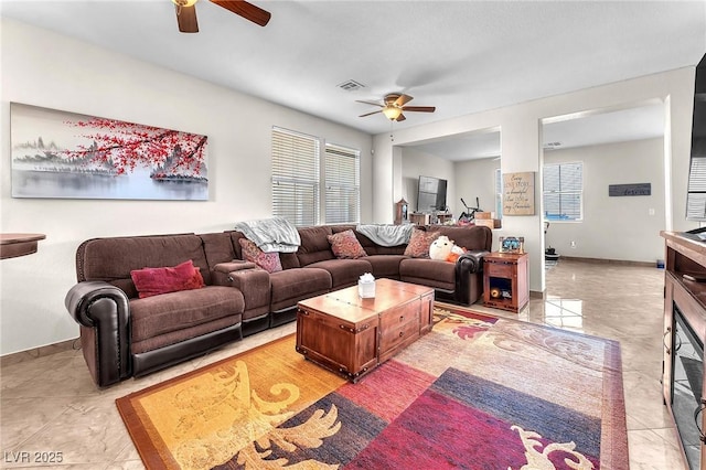 living room featuring ceiling fan