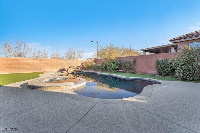 view of pool with a patio