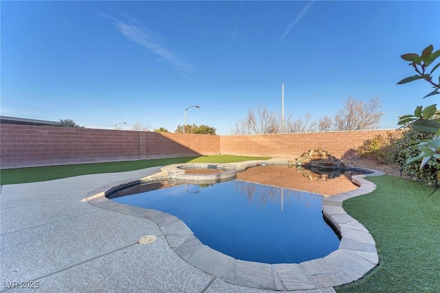 view of swimming pool featuring an in ground hot tub