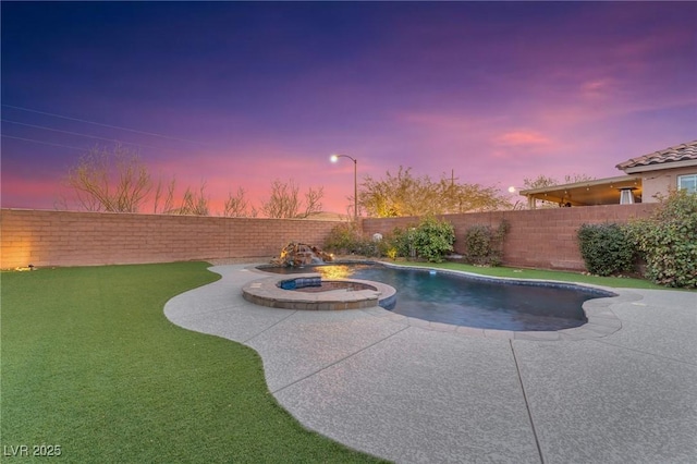 pool at dusk with a fire pit and a patio