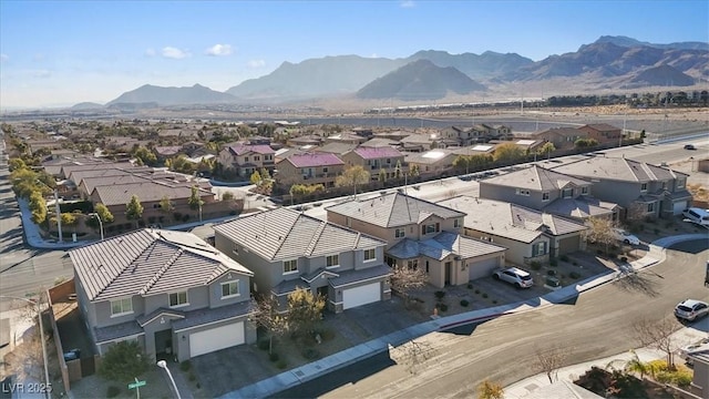 drone / aerial view featuring a mountain view