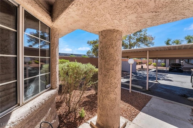 view of patio / terrace featuring a carport