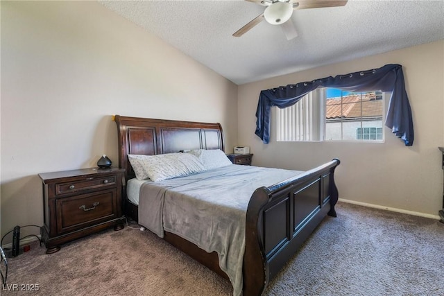 carpeted bedroom with a textured ceiling, vaulted ceiling, and ceiling fan