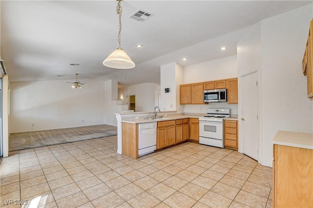 kitchen featuring white appliances, light tile patterned floors, sink, pendant lighting, and ceiling fan