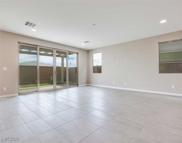 view of tiled spare room