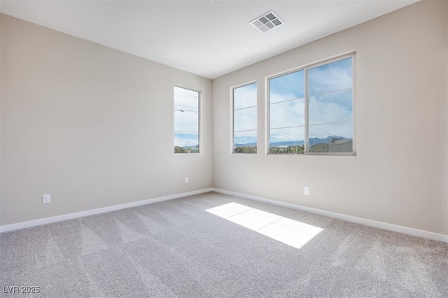 empty room with carpet flooring