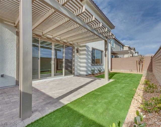 view of yard featuring a pergola and a patio area