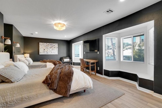 bedroom featuring light wood-type flooring