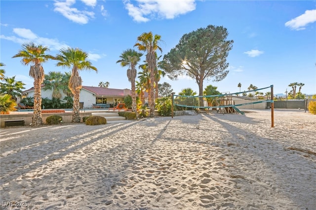 view of front of property featuring volleyball court