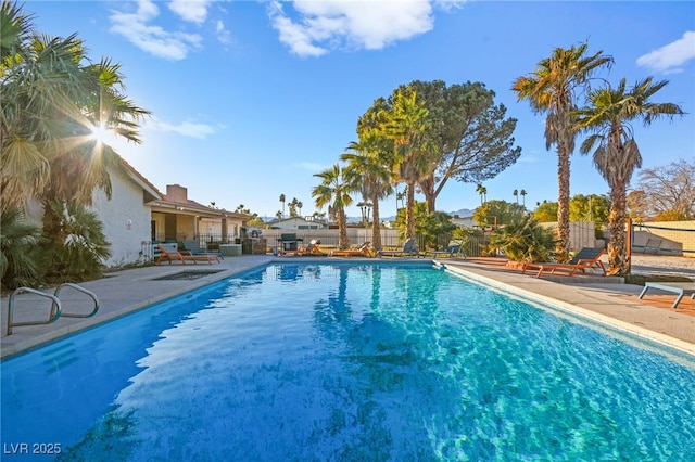 view of swimming pool featuring a patio area