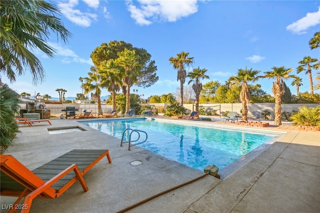 view of pool featuring a patio