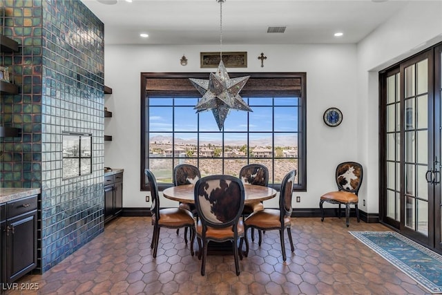 dining room featuring a healthy amount of sunlight