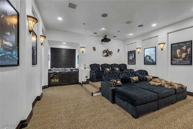 carpeted cinema with baseboards, visible vents, and recessed lighting