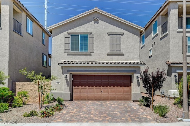 view of front of home with a garage