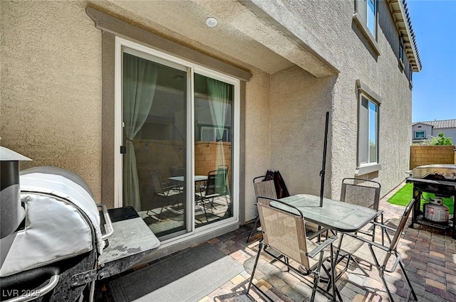 exterior space with a patio and grilling area