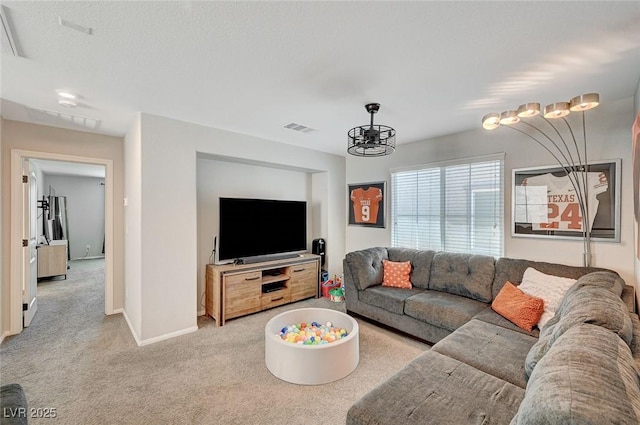 living room featuring light colored carpet