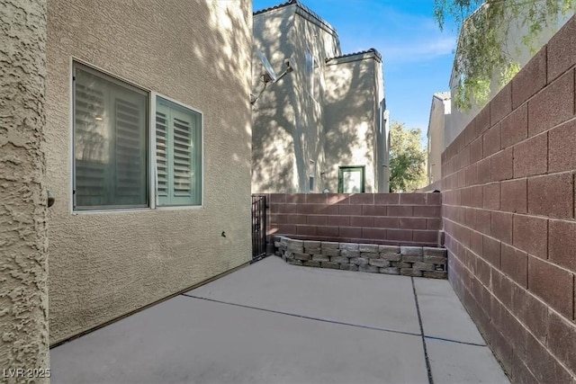 view of home's exterior featuring a patio