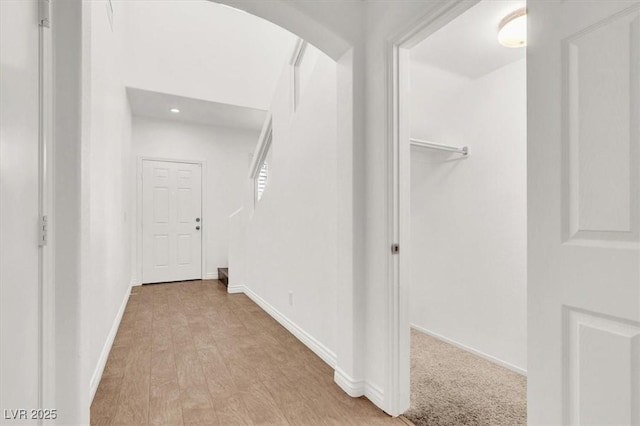 corridor featuring light hardwood / wood-style flooring