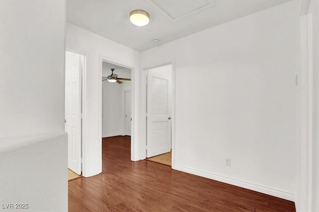 unfurnished room with hardwood / wood-style floors