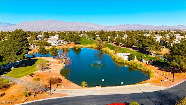 bird's eye view featuring a water and mountain view