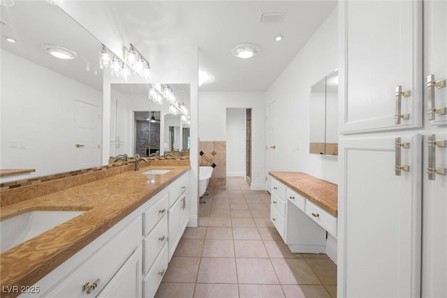 bathroom with vanity, shower with separate bathtub, and tile patterned flooring