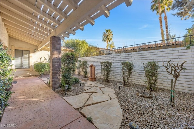 view of patio featuring a pergola