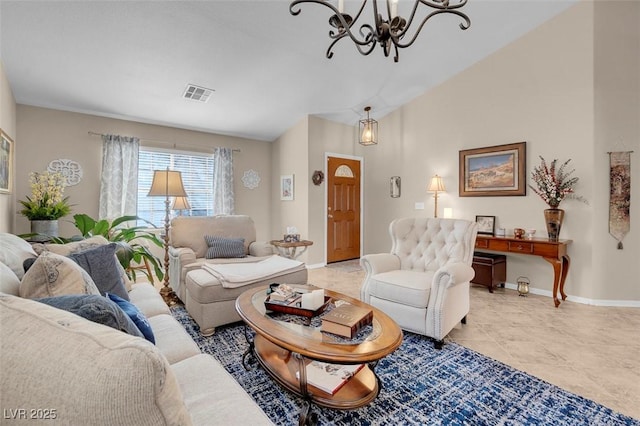 tiled living room with an inviting chandelier