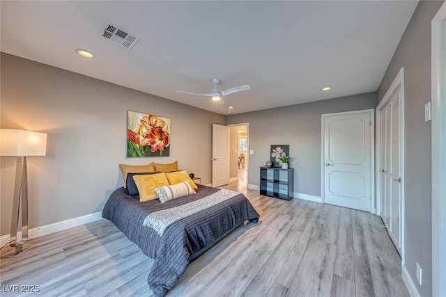 bedroom featuring ceiling fan and light hardwood / wood-style floors