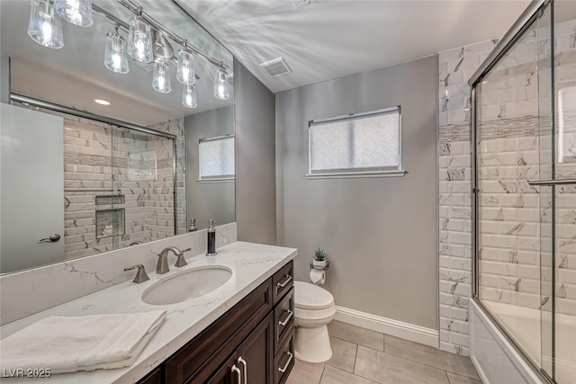 full bathroom with shower / bath combination with glass door, vanity, toilet, and tile patterned flooring