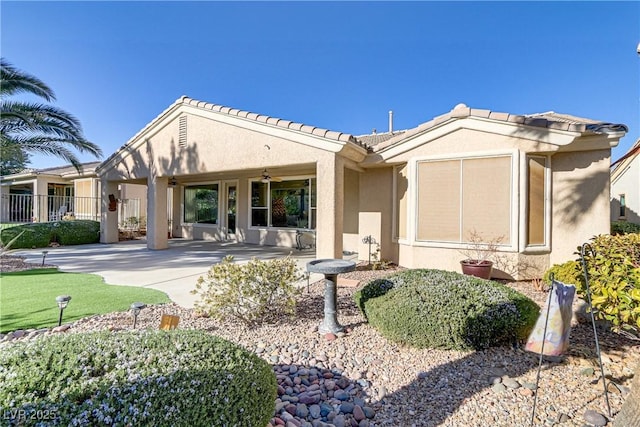 rear view of property with a patio