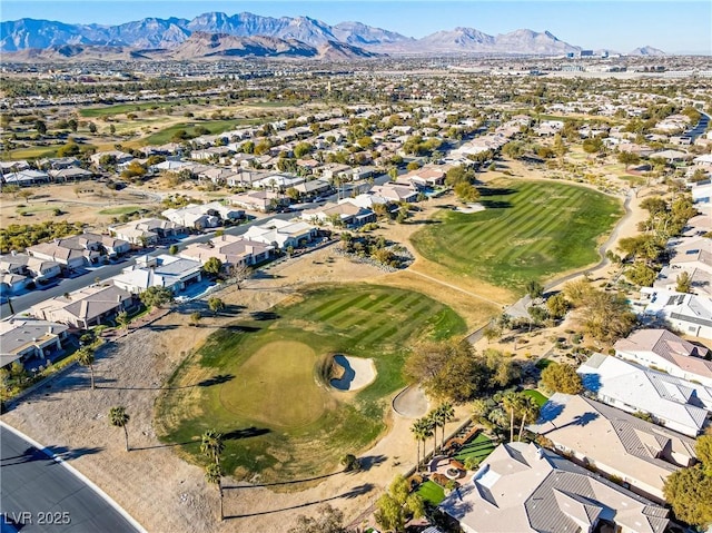 birds eye view of property featuring a mountain view