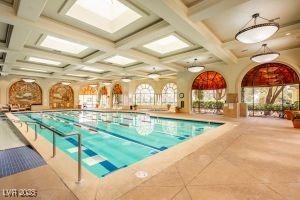 view of swimming pool with a skylight