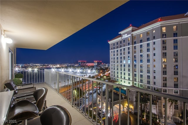 view of balcony at twilight