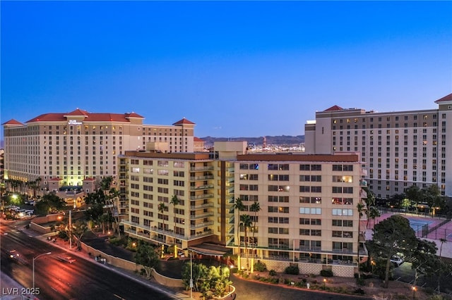 view of outdoor building at dusk