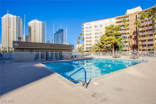 view of swimming pool with a patio