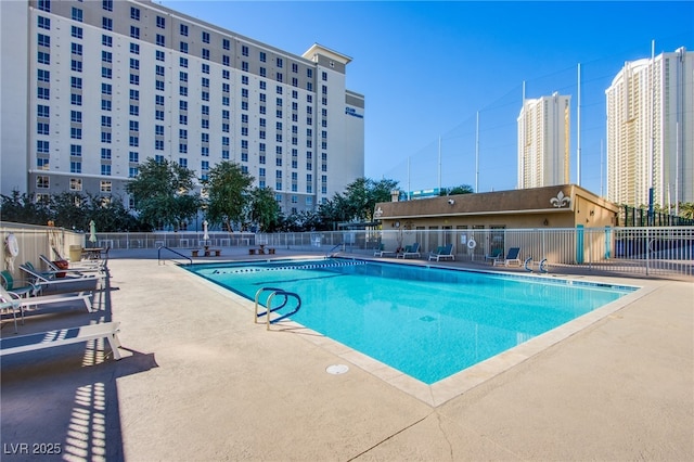 view of swimming pool featuring a patio