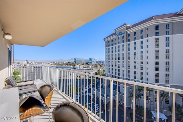 balcony featuring a mountain view