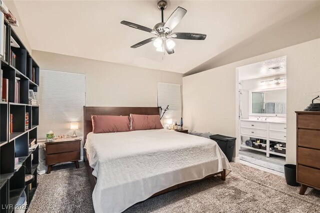 bedroom with a ceiling fan, dark colored carpet, and vaulted ceiling