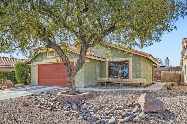 ranch-style house featuring a garage