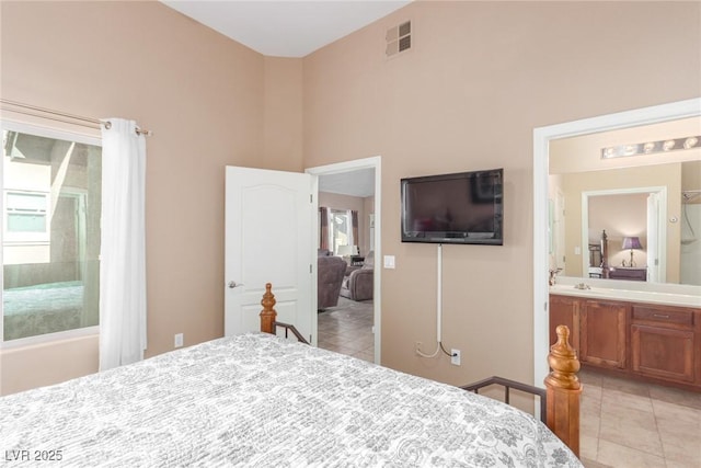 bedroom featuring ensuite bath