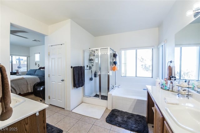 bathroom with vanity, shower with separate bathtub, and tile patterned floors