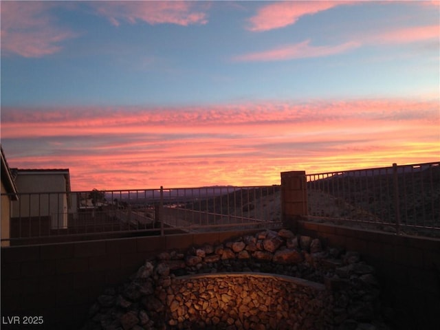 view of yard at dusk