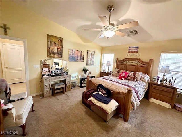 carpeted bedroom featuring vaulted ceiling and ceiling fan