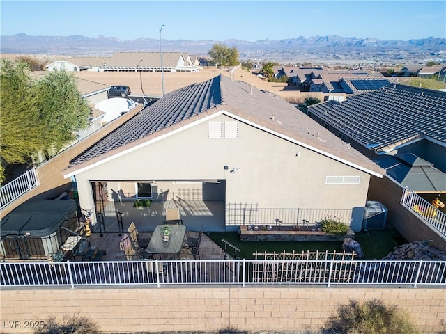 birds eye view of property with a mountain view